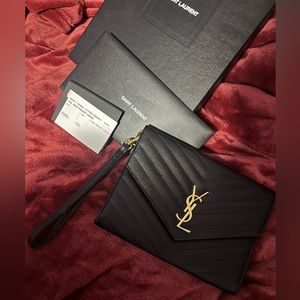 Yves Saint Laurent black clutch/ wristlet